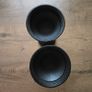 A pair of black candle holders Image 4