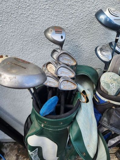 five golf bags and sixty nine clubs . ONE LOT ONLE.
