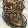 Bronzed Winged Cherub putto open seashell or leaf-shaped vessel with a scorpion like tail. Image 2