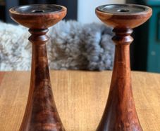Pair of mixed wood with metal insert candlestick holders