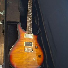 PRS-SE Custom 24 upgraded with Tremonti Bass and Treble Pickups and locking tuners.