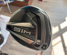 Sim driver with tour ad shaft