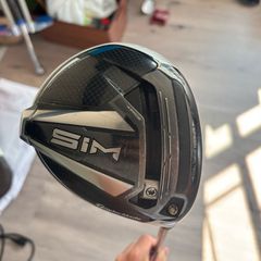 Sim driver with tour ad shaft