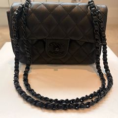 Rare all black C single flap bag.