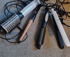 A lot of four Rowenta Remington and Carmen hair styling and care devices