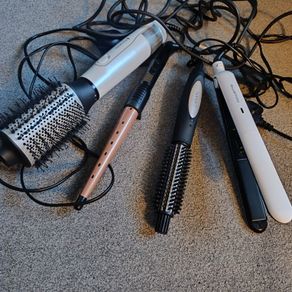 A lot of four Rowenta Remington and Carmen hair styling and care devices