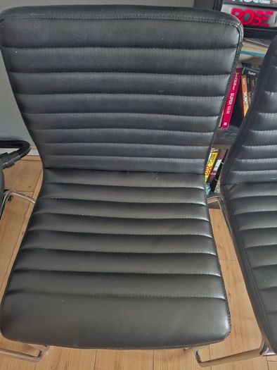 3 faux leather chairs