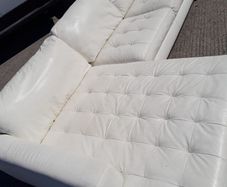 L shaped cream Italian leather couch
