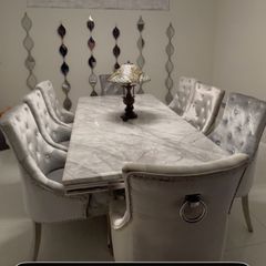 Marble top Dinning table sits 8 also 8 dinning chairs