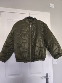 New coat one size fits up to XL