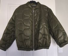 New coat one size fits up to XL