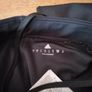 black Adidas Techfit leggings. Image 3