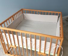 Baby playpen with adjustable height