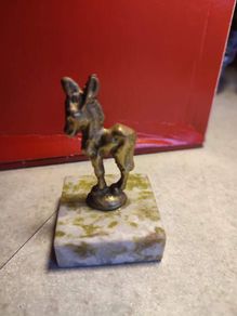Figure Of  Donkey On Plinth Of Marble.