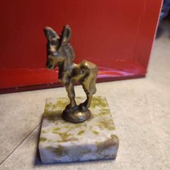 Figure Of  Donkey On Plinth Of Marble.