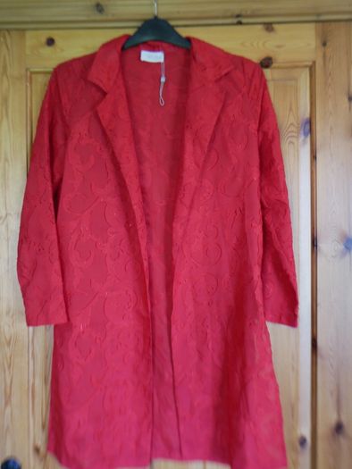 Ladies edge to edge top. Size 10. New. Red