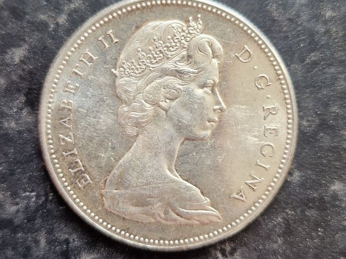 Two Canadian Silver Dollars 1867-1967