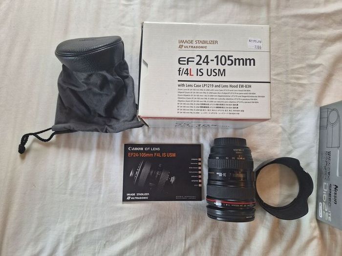 canon camera and pro lenses and a Pentax film system