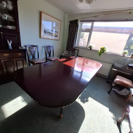 Hand carved Mahogany dinning table with 6 chairs