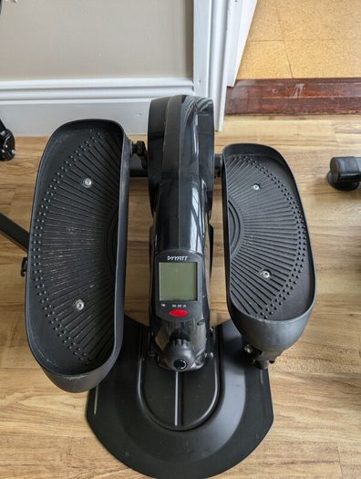 YYFITT under-desk elliptical / pedal exerciser.
