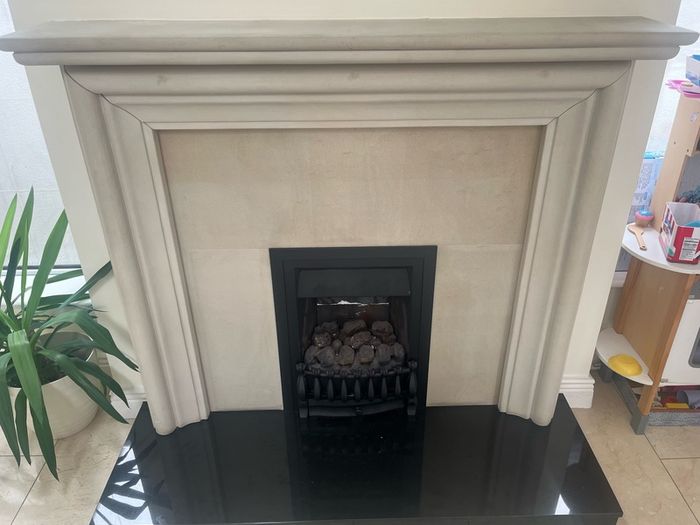 stone fireplace with gas fire