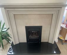 stone fireplace with gas fire