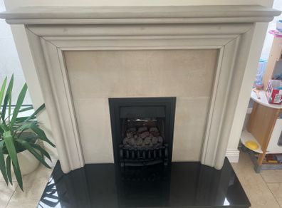 stone fireplace with gas fire