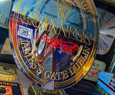 Vintage Guinness oval pub mirror