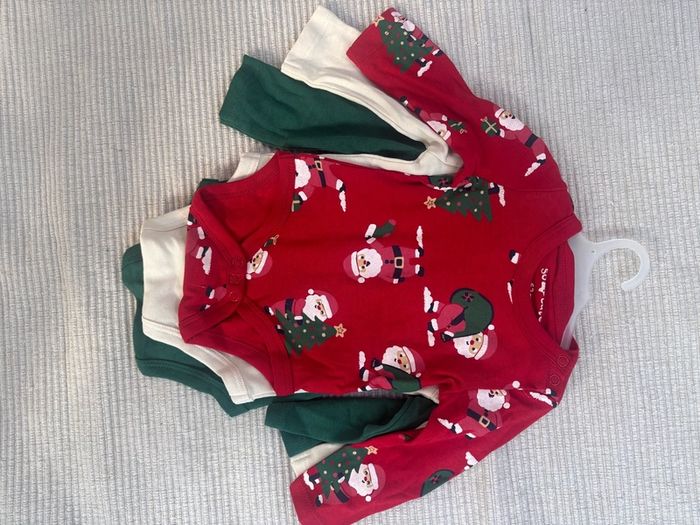 Baby Christmas outfits/onesies