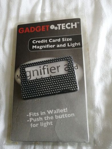 Credit card size magnifier and light. Price reduction