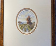 picture a small watercolour signed in a walnut frame