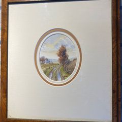 picture a small watercolour signed in a walnut frame