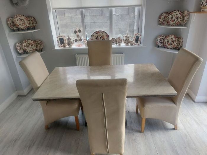 cream marble table and 4 chairs