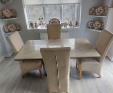 cream marble table and 4 chairs