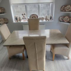 cream marble table and 4 chairs