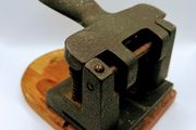 Vintage cast iron hole punch