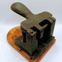 Vintage cast iron hole punch