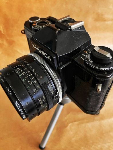 Yashica FX-D Quartz compact, manual-focus 35mm SLR film camera + 3 lenses.
