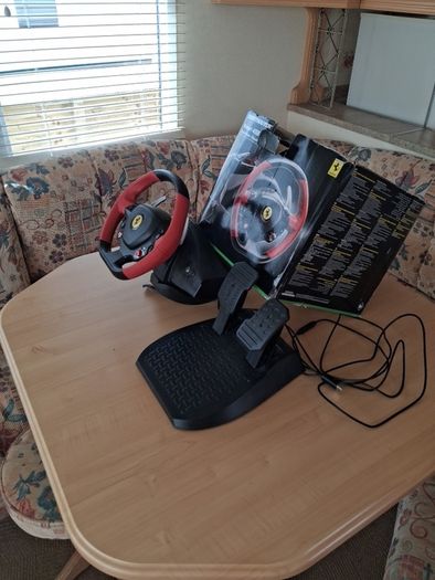 A  Ferrari wheel and pedals for xbox good condition