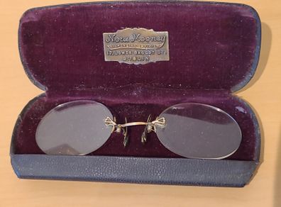Very collectable vintage clip on glasses from Nora Mooney optician's