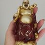 The Hotei (Laughing Buddha) figurine is a talisman of wealth and good fortune. Image 2