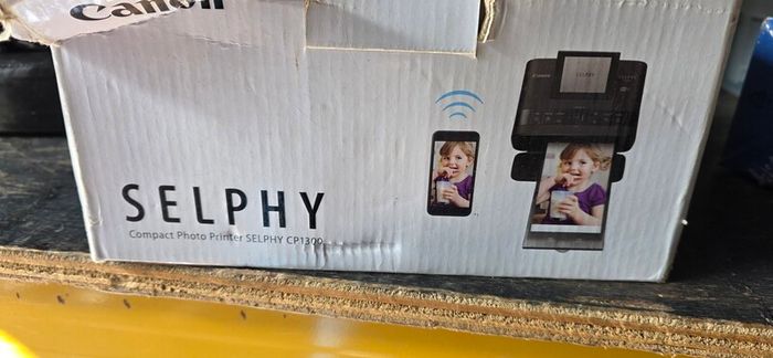 Canon selphy cp1300