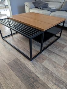 Industrial style coffee table with oak top and metal frame