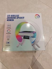 Wireless charging speaker, radio and clock. Night lamp with multiple colours to choose.