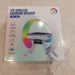 Wireless charging speaker, radio and clock. Night lamp with multiple colours to choose.