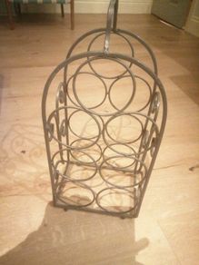 Handcrafted Wine bottles stand polished cast iron