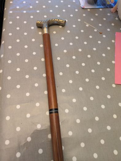 Collapsible wooden walking stick with decorative handle