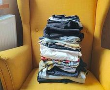Pile of man's clothes in size Large