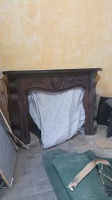 wooden fire place / surround
