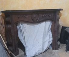 wooden fire place / surround